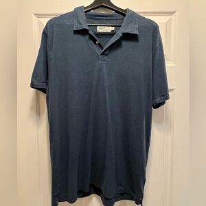 Wellen (Huckberry) hemp navy blue polo shirt.